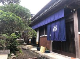 ゲストハウス Rei，位于本宫的别墅