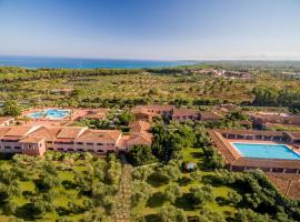 I Giardini di Cala Ginepro Hotel Resort，位于卡拉·利贝罗托的酒店