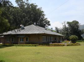 Ama Stays and Trails Tea Estate Bungalows , Munnar，位于蒙纳的乡村别墅