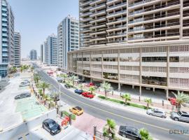 Gentle Studio in Uniestate Sports Tower Dubai Sports City by Deluxe Holiday Homes，位于迪拜的乡间豪华旅馆