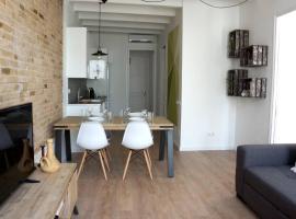 Barcelona Industrial Style Apartment，位于略夫雷加特河畔奥斯皮塔莱特圣欧拉莉亚附近的酒店