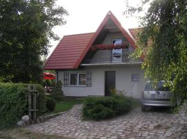 Domek pod Klonami na Mazurach，位于Guty的度假屋