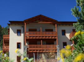 维卡西奥利伊萨德小屋公寓式酒店，位于安格勒的酒店