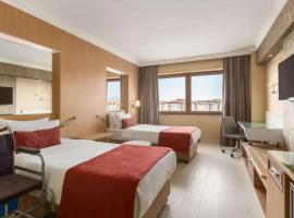 华美达乌沙克酒店，位于乌沙克的酒店