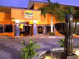 墨西哥别墅酒店，位于锡瓦塔塔内霍伊斯塔帕·芝华塔尼欧国际机场 - ZIH附近的酒店