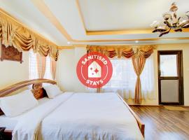 Capital O 79144 Coniferous Resort，位于乞拉朋齐的酒店