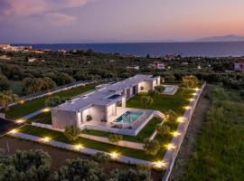 Merelia Luxury Villas - Halkidiki，位于尼亚·蒙达尼亚的度假屋
