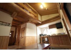 Log house for 12 people - Vacation STAY 35069v，位于南小国町的带停车场的酒店