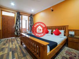 Capital O 47240 Hotel Blossom Resort，位于考萨尼的酒店
