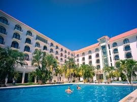Hotel Caracol Plaza，位于埃斯孔迪多港的家庭/亲子酒店