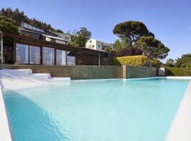 Apartamento con piscina y excelentes vistas，位于费罗尔的海滩短租房