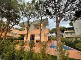 Beachfront villa in Qerret beach with a private pool