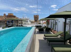 Aquitania Home Suites，位于塞维利亚的带泳池的酒店