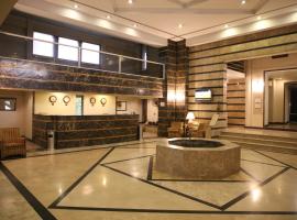 拉合尔卡尔顿塔酒店，位于拉合尔阿拉马·伊克巴勒国际机场 - LHE附近的酒店