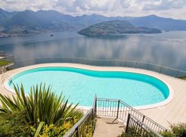 La villetta in residence con piscina e vista lago，位于Parzanica的酒店