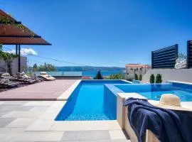 LUXURY VILLA PARADISE 120m from sandy beach, heated pool, billiard, max 12 pax