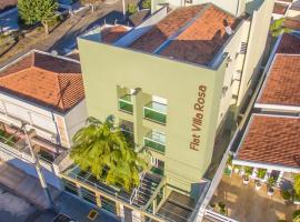 Hotel Flat Villa Rosa，位于伊塔佩蒂宁加的酒店