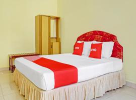 OYO 90423 Hotel Aman，位于帕朗卡拉亚的酒店