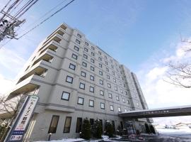 鹤冈国际路特旅馆，位于鹤冈市加茂水族馆附近的酒店