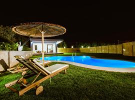 Chania Oasis with heated pool，位于干尼亚的别墅