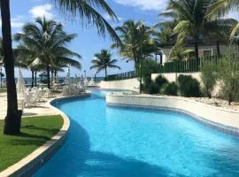 Flat no Beach Class Muro Alto