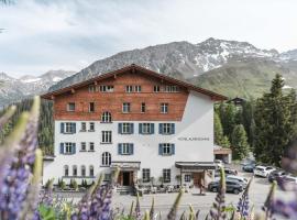 Hotel Alpensonne - Panoramazimmer & Restaurant，位于阿罗萨的高尔夫酒店