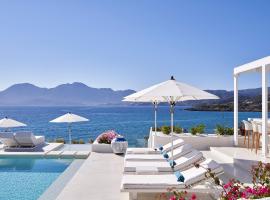 The Island Concept Luxury Boutique Hotel Heated Pool，位于阿基欧斯尼古拉斯的公寓式酒店