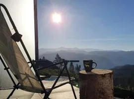 Tiny mountain cabin with a panoramic view