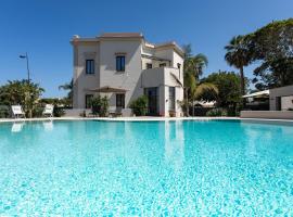 Villa Masetta - Luxury Suites，位于蒙德罗的带泳池的酒店