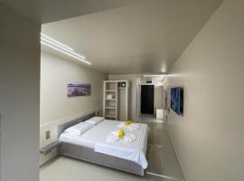 Jxn Rooms，位于萨图恩的酒店