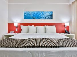 Ramada Hotel & Suites Campos Pelinca，位于坎普斯戈伊塔卡济斯巴特勒莫里萨多机场 - CAW附近的酒店