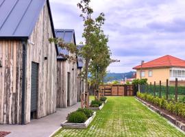 Casitas de Madera O Loureiro，位于诺雅的公寓