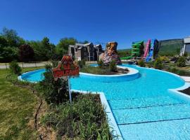 Condo avec foyer, piscine et parc aquatique !，位于博普雷的酒店