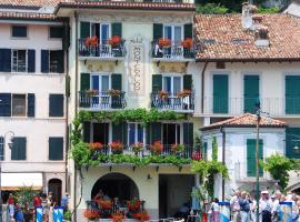 阿贝尔哥意大利酒店，位于利莫内-苏尔加达Bike Path Limone sul Garda附近的酒店