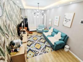 中央大街两室一厅美式家庭房品牌床垫地铁附近索菲亚，位于哈尔滨的酒店