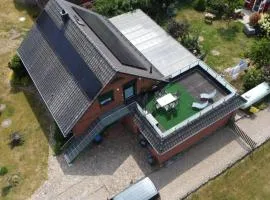 Ferienwohnung-in-Mecklenburg-am-Kritzower-See-mit-Ruderboot