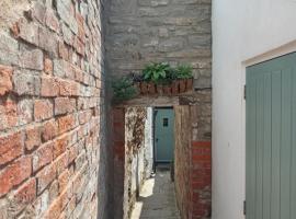 Delighful self catering in the heart of Glastonbury，位于格拉斯顿伯里的度假短租房