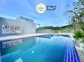 The Palms Residence - SHA Extra Plus，位于普吉镇的酒店