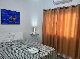 Suite 03 - Independente, privativa e aconchegante，位于库亚巴的度假屋