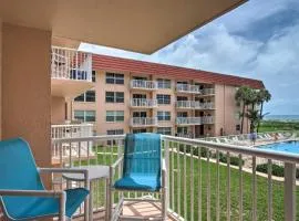 Sunny Cocoa Beach Condo Balcony and Community Pool
