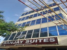OYO Flagship 81023 Sanjay Suites，位于Āvadi的酒店
