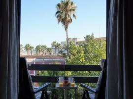 Apartamentos IMPLUVIUM Mérida，位于梅里达的酒店
