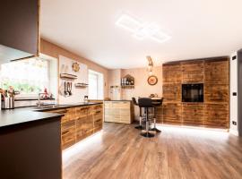 Sa Mont Home - Moderno appartamento con parcheggio, sauna e deposito sci，位于贝拉蒙特的酒店