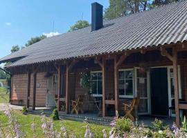 Palūšės Kempingas (kambariai)，位于帕卢舍的酒店