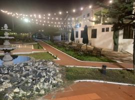 Escondido Hotel，位于特马的酒店