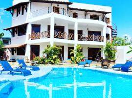 Hotel e Pousada Cumbuco Guesthouse，位于卡姆布库的高尔夫酒店