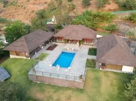 StayVista's Vyoman Villa - Experience a valley view, lush lawn, spa, and yoga retreat