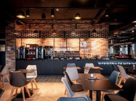 ibis Styles Valenciennes Petite Foret，位于珀蒂福雷的酒店