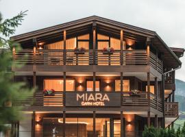 Garni Hotel Miara - Your Dolomites Home，位于塞尔瓦迪加尔代纳山谷西阿姆皮诺伊缆车附近的酒店