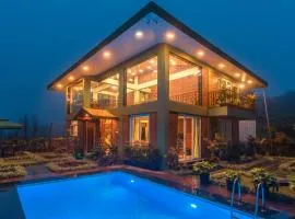 Status Villa by StayVista - Valleys view, Traditional-modern blend interiors, Private plunge pool & Gazebo